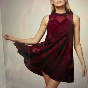 FREE PEOPLE BURGUNDY DRESS/ SIZE M/M /100 % COTTON WITH PEEK A BOO BACK